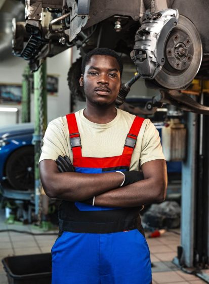 african-man-mechanic-in-uniform-at-the-car-repair-2025-02-24-19-02-45-utc.jpg