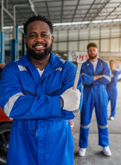 portrait-of-man-auto-mechanic-working-at-car-repai-2024-07-09-00-54-05-utc.jpg